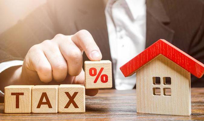 Impuestos involucrados en la compra de una propiedad